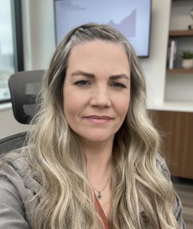 Weston's Code Enforcement Officer, Brandi Dunlap, looking at camera and smiling. 