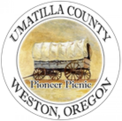 Umatilla County Weston Oregon in circle around covered wagon with words Pioneer Picnic underneath wagon